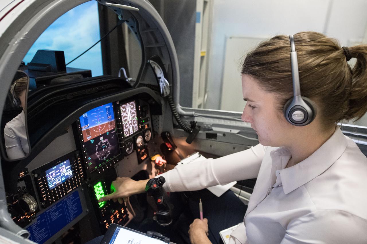 jsc2018e032520 (03-30-18) --- 2017 NASA astronaut candidate Kayla Barron practices procedures during T-38 flight simulator training in Houston. Photo Credit: (NASA/James Blair)