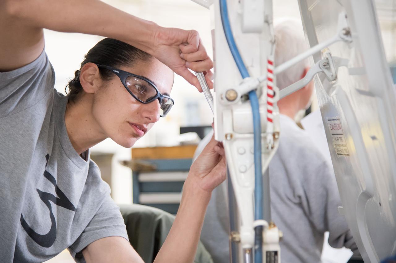 jsc2018e035270 (April 09, 2018) --- 2017 NASA astronaut candidate Jasmin Moghbeli during T-38 engine maintenance training at Ellington Field in Houston. Photo Credit: (NASA/Josh Valcarcel)