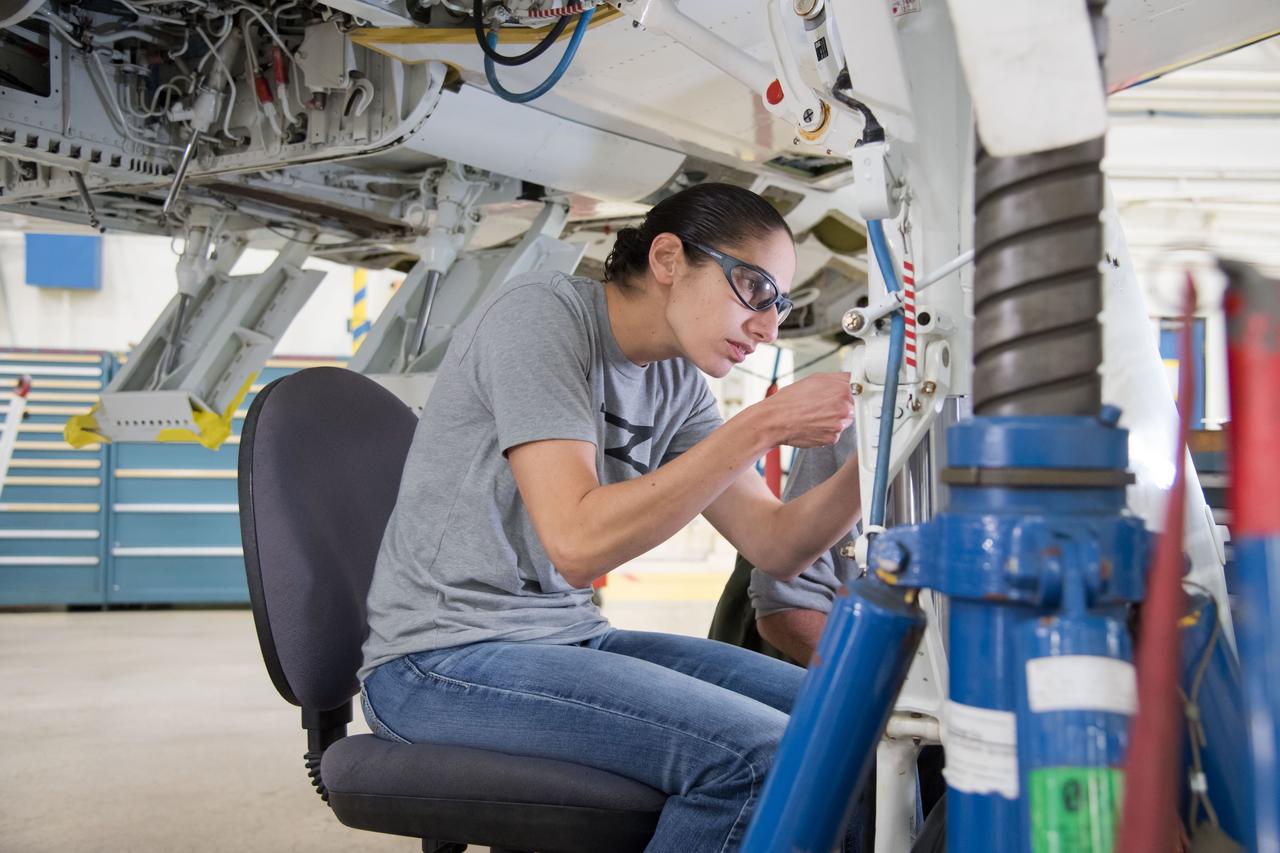 jsc2018e035272 (April 09, 2018) --- 2017 NASA astronaut candidate Jasmin Moghbeli during T-38 engine maintenance training at Ellington Field in Houston. Photo Credit: (NASA/Josh Valcarcel)