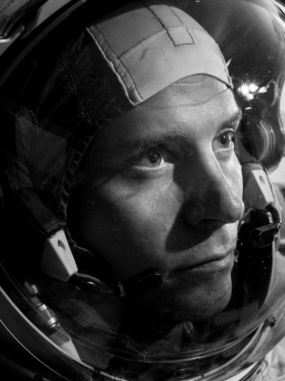 (April 20, 2018) -- Portrait view of Expedition 57/58 Crew Member Nick Hague wearing EMU helmet. Photo credit: NASA/Josh Valcarcel