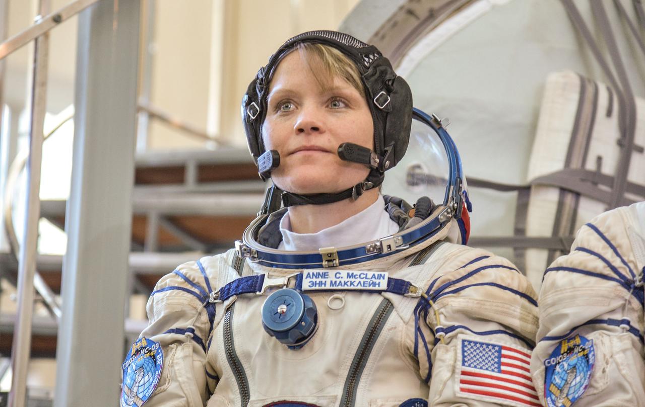 jsc2018e043407 (May 10, 2018) --- At the Gagarin Cosmonaut Training Center in Star City, Russia, Expedition 56 backup crew member Anne McClain of NASA listens to a reporter’s question May 10 following her final Soyuz qualification May 10. McClain, Oleg Kononenko of Roscosmos and David Saint-Jacques of the Canadian Space Agency are the backups to the prime crew of Serena Aunon-Chancellor of NASA, Sergey Prokopyev of Roscosmos and Alexander Gerst of the European Space Agency, who will launch June 6 from the Baikonur Cosmodrome in Kazakhstan on the Soyuz MS-09 spacecraft for a six-month mission on the International Space Station...NASA/Elizabeth Weissinger.
