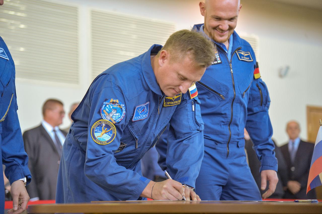 jsc2018e043411 (May 10, 2018) --- At the Gagarin Cosmonaut Training Center in Star City, Russia, Expedition 56 prime crew member Sergey Prokopyev of Roscosmos signs in for the first of two days of final Soyuz qualification exams May 10. Prokopyev, Serena Aunon-Chancellor of NASA and Alexander Gerst of the European Space Agency will launch June 6 from the Baikonur Cosmodrome in Kazakhstan on the Soyuz MS-09 spacecraft for a six-month mission on the International Space Station...NASA/Elizabeth Weissinger.
