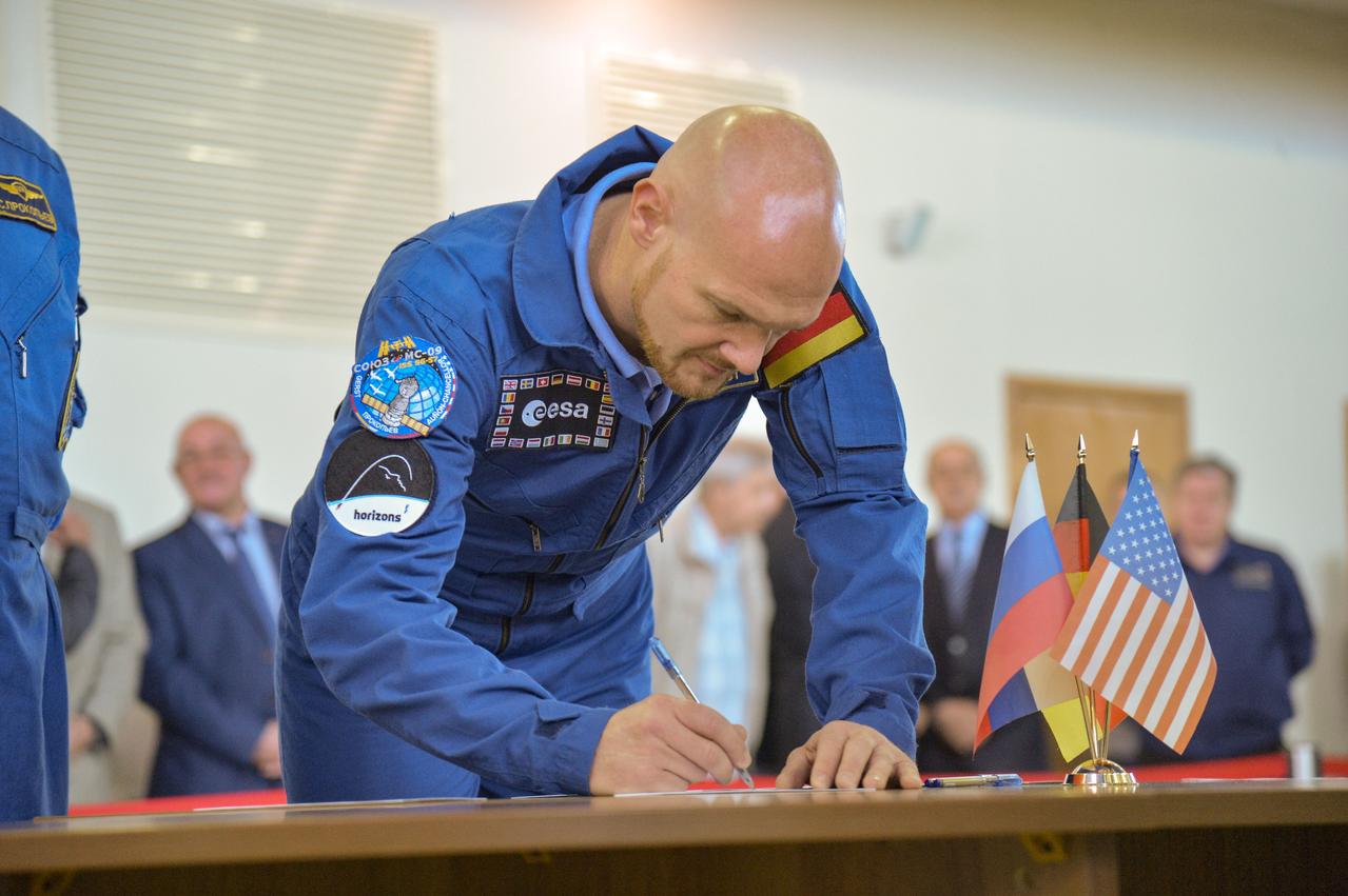 jsc2018e043413 (May 10, 2018) --- At the Gagarin Cosmonaut Training Center in Star City, Russia, Expedition 56 prime crew member Alexander Gerst signs in for the first of two days of final Soyuz qualification exams May 10. Gerst, Serena Aunon-Chancellor of NASA and Sergey Prokopyev of Roscosmos will launch June 6 from the Baikonur Cosmodrome in Kazakhstan on the Soyuz MS-09 spacecraft for a six-month mission on the International Space Station...NASA/Elizabeth Weissinger.