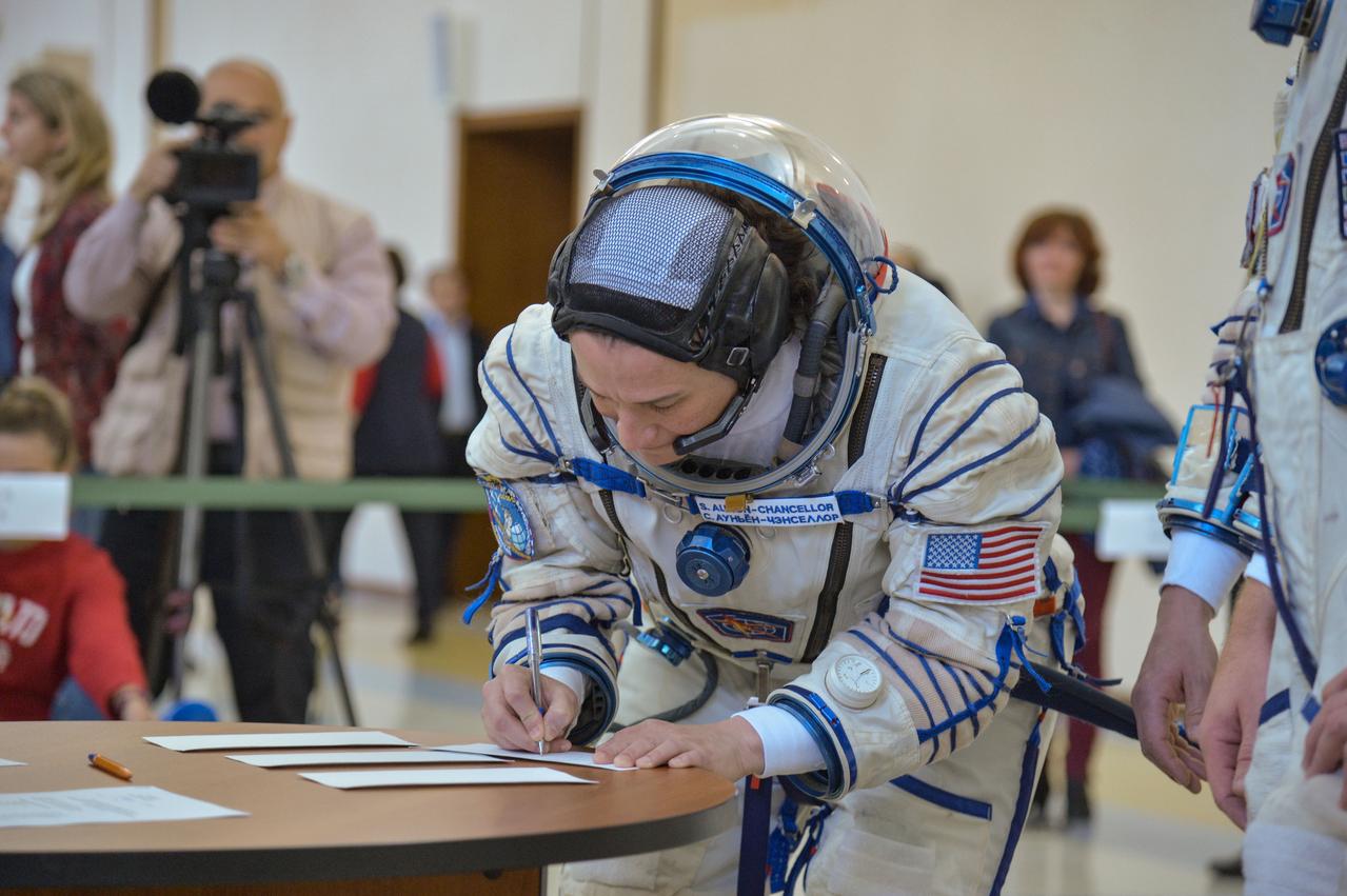 jsc2018e044091 - At the Gagarin Cosmonaut Training Center in Star City, Russia, Expedition 56 crewmember Serena Aunon-Chancellor of NASA signs in for the final day of Soyuz qualification exams May 11. Aunon-Chancellor. Sergey Prokopyev of Roscosmos and Alexander Gerst of the European Space Agency will launch June 6 on the Soyuz MS-09 spacecraft from the Baikonur Cosmodrome in Kazakhstan for a six-month mission on the International Space Station...NASA/Elizabeth Weissinger.