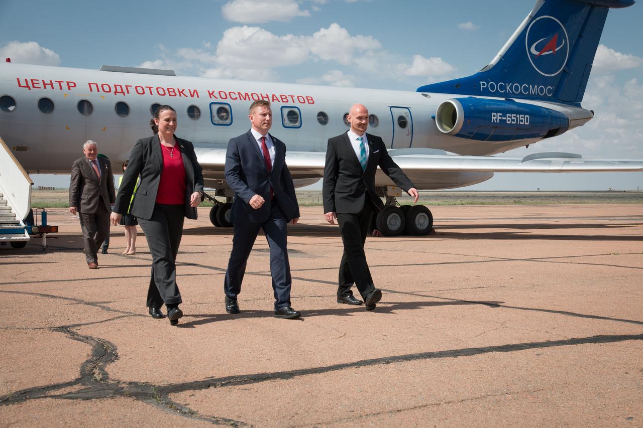 jsc2018e049986 - Expedition 56 crewmembers Serena Aunon-Chancellor of NASA (left), Sergey Prokopyev of Roscosmos (center) and Alexander Gerst of the European Space Agency (right) arrive at their launch site at the Baikonur Cosmodrome in Kazakhstan May 19 for final pre-launch training after a flight from their training base in Star City, Russia. They will launch June 6 on the Soyuz MS-09 spacecraft from the Baikonur Cosmodrome for a six-month mission on the International Space Station...NASA/Victor Zelentsov.
