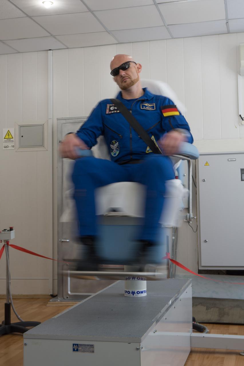 jsc2018e050828 - At the Cosmonaut Hotel crew quarters in Baikonur, Kazakhstan, Expedition 56 prime crewmember Alexander Gerst of the European Space Agency takes a spin in a rotating chair May 29 to test his vestibular system as part of pre-launch activities. Gerst, Serena Aunon-Chancellor of NASA and Sergey Prokopyev of Roscosmos will launch June 6 from the Baikonur Cosmodrome in Kazakhstan on the Soyuz MS-09 spacecraft for a six-month mission on the International Space Station...NASA/Victor Zelentsov.