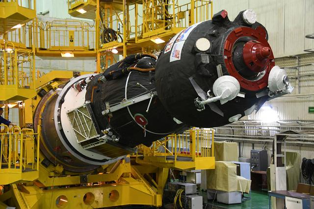 jsc2018e050837 - In the Integration Facility at the Baikonur Cosmodrome in Kazakhstan, the Soyuz MS-09 spacecraft is lowered from its test stand May 29 in preparation for its encapsulation into the upper stage of its Soyuz booster rocket. Serena Aunon-Chancellor of NASA, Alexander Gerst of the European Space Agency and Sergey Prokopyev of Roscosmos will launch June 6 from the Baikonur Cosmodrome on the Soyuz MS-09 spacecraft for a six-month mission on the International Space Station...Courtesy: Roscosmos and RSC-Energia.