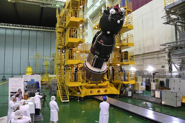 jsc2018e050841 - In the Integration Facility at the Baikonur Cosmodrome in Kazakhstan, the Soyuz MS-09 spacecraft is lowered from its test stand May 29 in preparation for its encapsulation into the upper stage of its Soyuz booster rocket. Serena Aunon-Chancellor of NASA, Alexander Gerst of the European Space Agency and Sergey Prokopyev of Roscosmos will launch June 6 from the Baikonur Cosmodrome on the Soyuz MS-09 spacecraft for a six-month mission on the International Space Station...Courtesy: Roscosmos and RSC-Energia.
