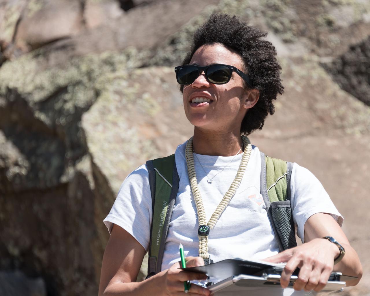 jsc2018e060054 (06/18/2018) --- 2017 NASA astronaut candidate Jessica Watkins during earth and planetary science training in Rio Grande del Norte National Monument Upper Gorge Area near Questa, N.M. Photo Credit: (NASA/Norah Moran)