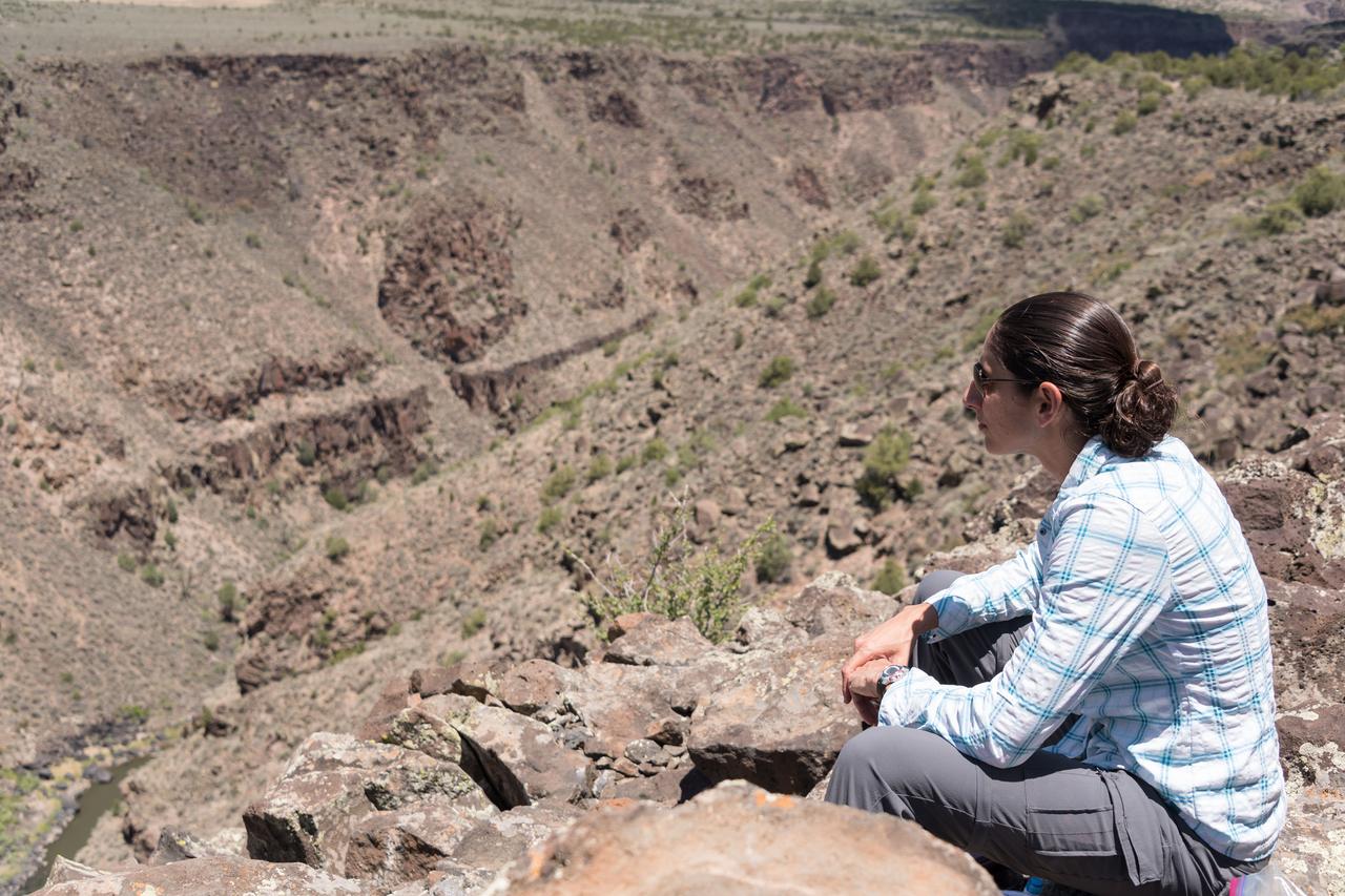 jsc2018e060090 (06/18/2018) --- 2017 NASA astronaut candidate Jasmin Moghbeli during earth and planetary science training in Rio Grande del Norte National Monument Upper Gorge Area near Questa, N.M. Photo Credit: (NASA/Norah Moran)