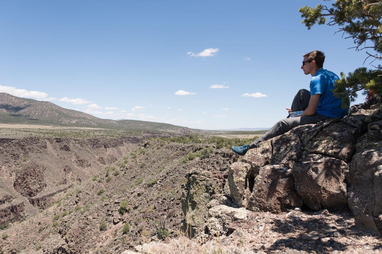 jsc2018e060091 (06/18/2018) --- 2017 NASA astronaut candidate Warren Hoburg during earth and planetary science training in Rio Grande del Norte National Monument Upper Gorge Area near Questa, N.M. Photo Credit: (NASA/Norah Moran)
