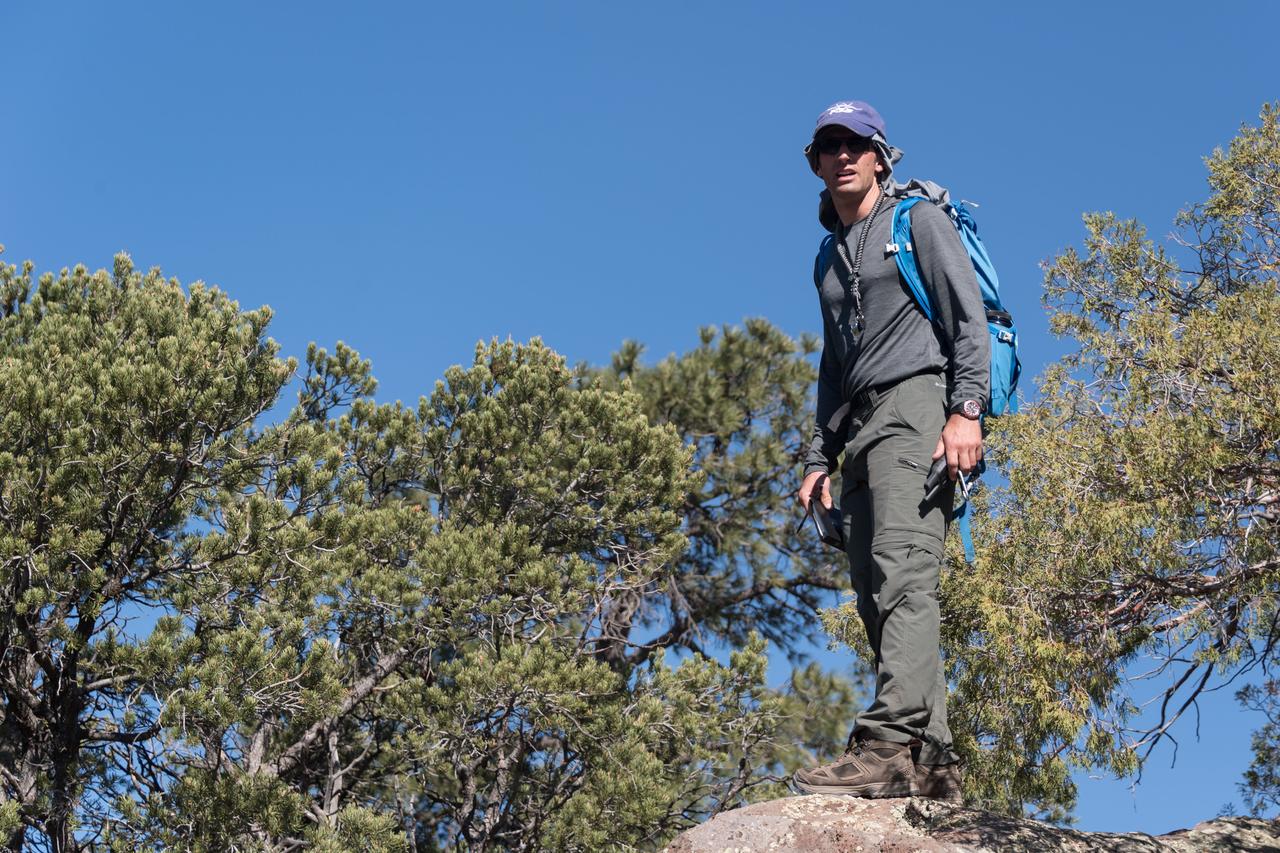 jsc2018e060151 (06/19/2018) --- Canadian Space Agency astronaut candidate Joshua Kutryk during earth and planetary science training in Rio Grande del Norte National Monument Upper Gorge Area near Questa, N.M. Photo Credit: (NASA/Norah Moran)