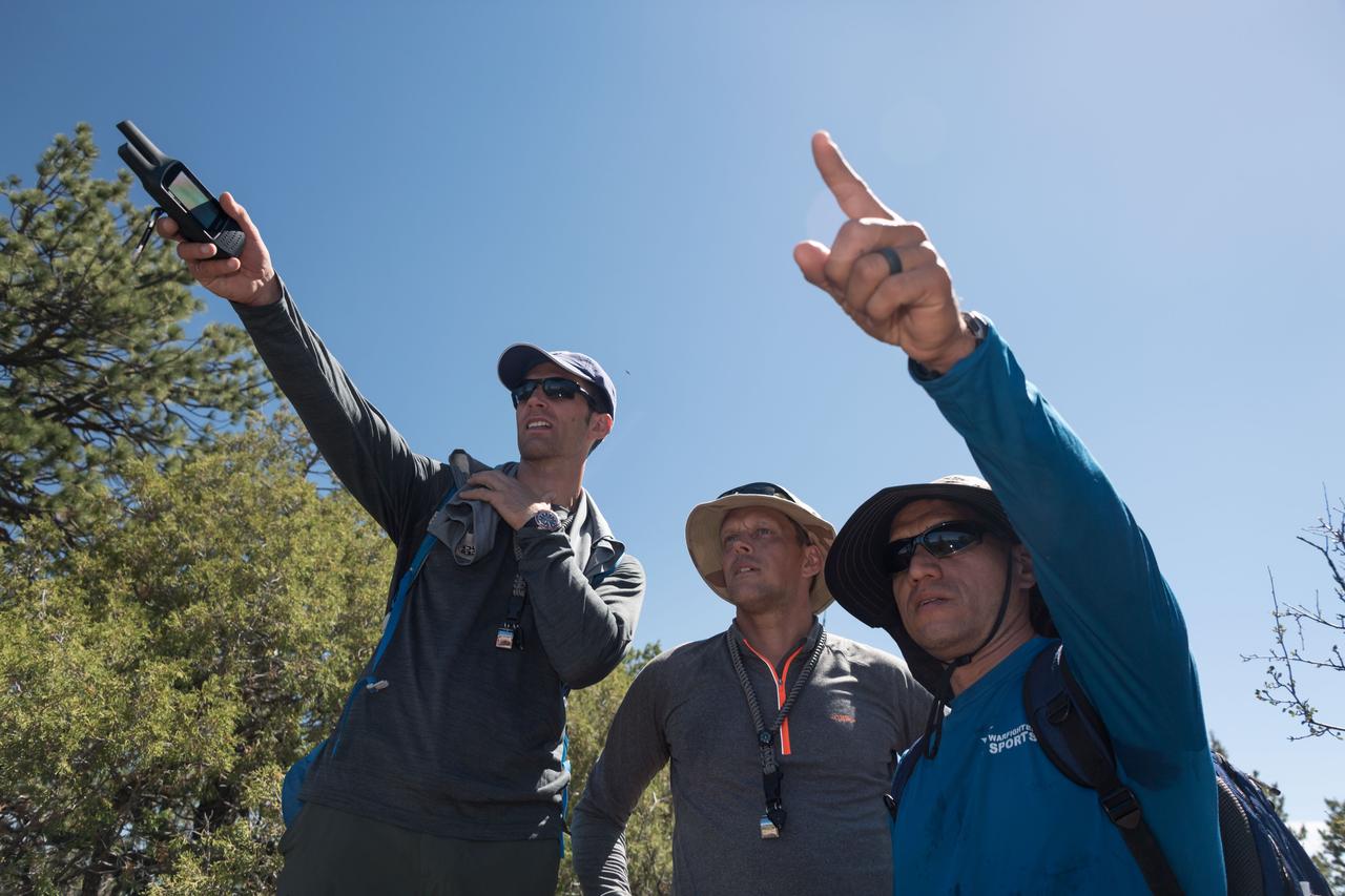 jsc2018e060179 (06/19/2018) ---(L-R) Canadian Space Agency astronaut candidates Joshua Kutryk and NASA astronaut candidates Bob Hines and Frank Rubio during earth and planetary science training in Rio Grande del Norte National Monument Upper Gorge Area near Questa, N.M. Photo Credit: (NASA/Norah Moran)