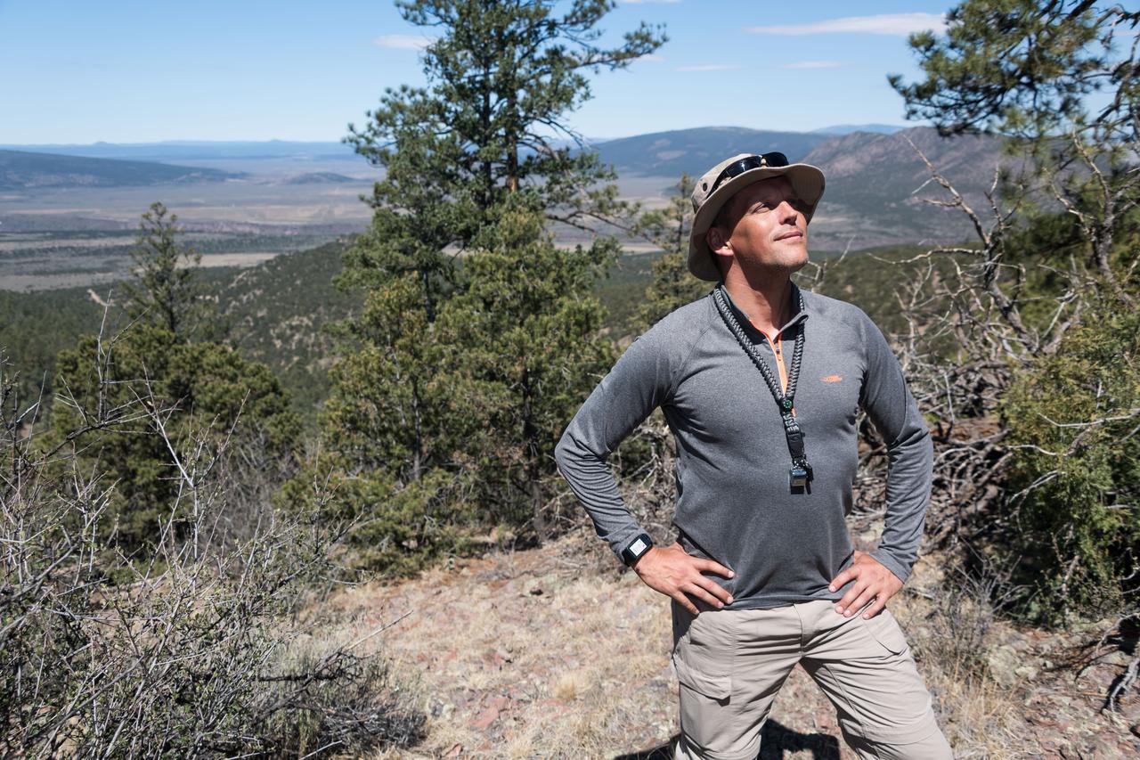 jsc2018e060183 (06/19/2018) --- 2017 NASA astronaut candidate Bob Hines during earth and planetary science training in Rio Grande del Norte National Monument Upper Gorge Area near Questa, N.M. Photo Credit: (NASA/Norah Moran)