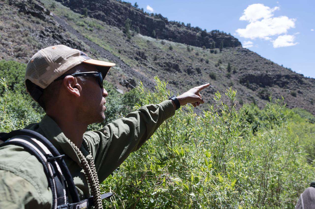 jsc2018e060210 (06/19/2018) --- 2017 NASA astronaut candidate Raja Chari during earth and planetary science training in Rio Grande del Norte National Monument Upper Gorge Area near Questa, N.M. Photo Credit: (NASA/Norah Moran)