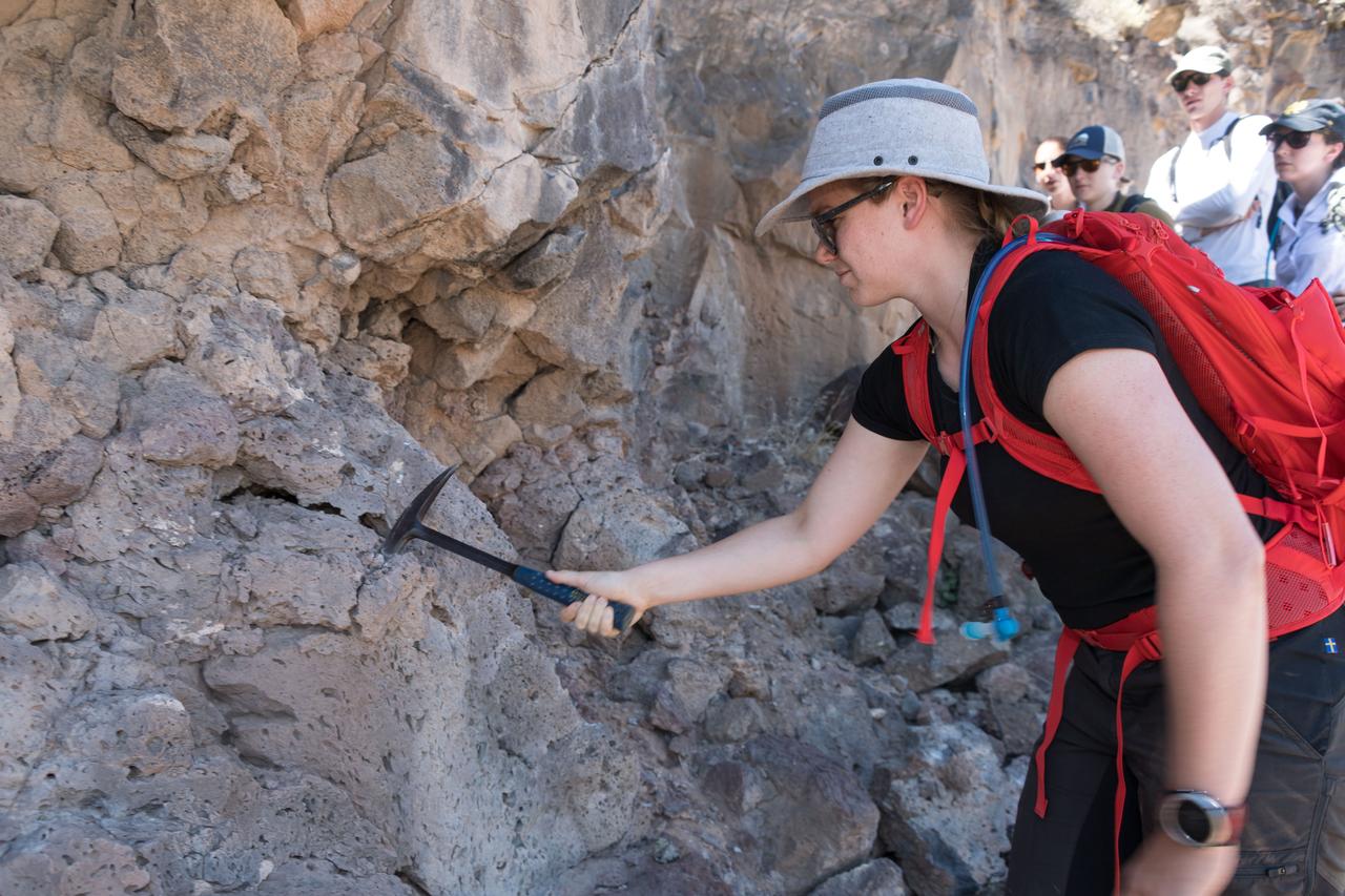 jsc2018e060335 (06/20/2018) --- Canadian Space Agency astronaut candidate Jennifer Sidey-Gibbons during earth and planetary science training in Rio Grande del Norte National Monument Upper Gorge Area near Questa, N.M. Photo Credit: (NASA/Norah Moran)
