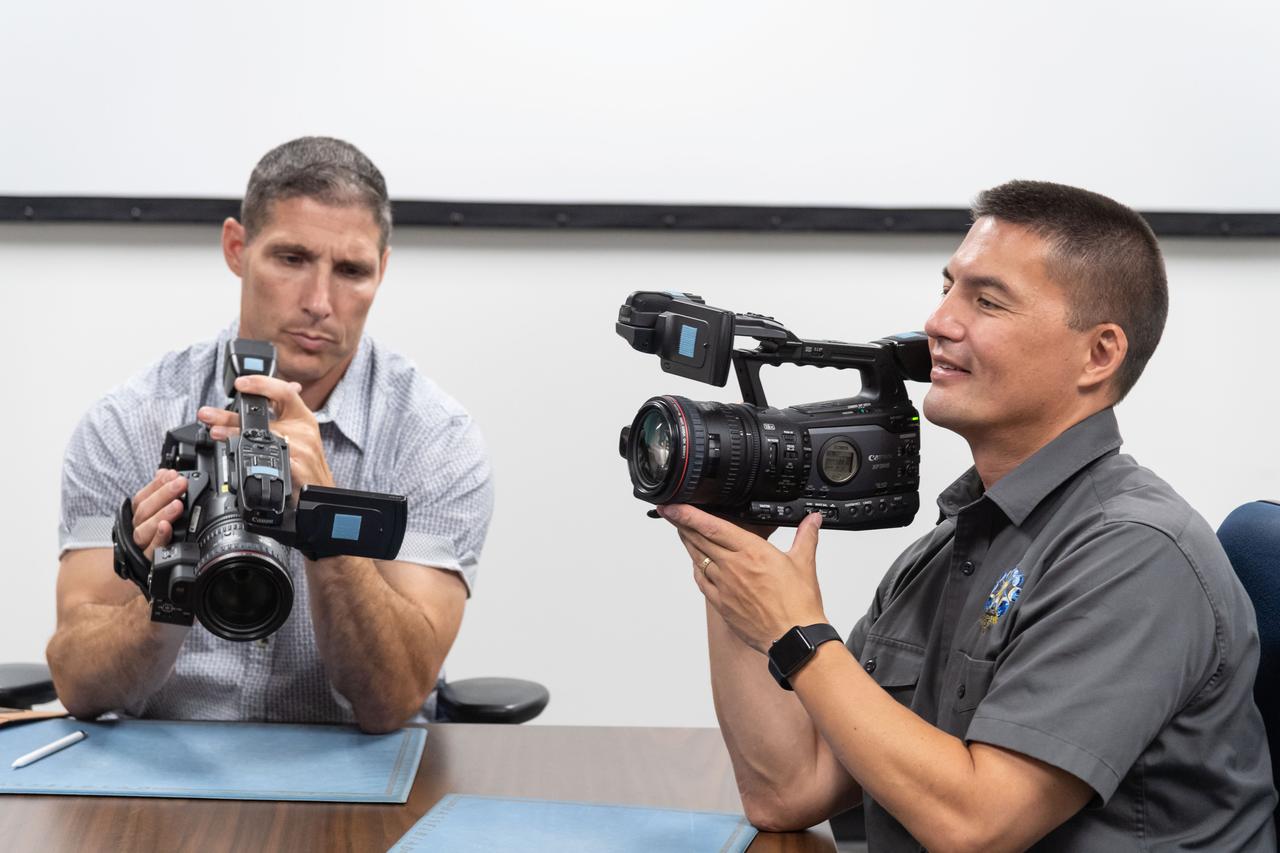 NASA Commercial Crew Program Astronauts Mike Hopkins and Kjell Lindgren practice operating the cameras they would use on board the International Space Station. Hopkins is assigned to the second flight of SpaceX’s Crew Dragon, and Lindgren is assigned as a backup for the Crew Dragon’s first and second flights.