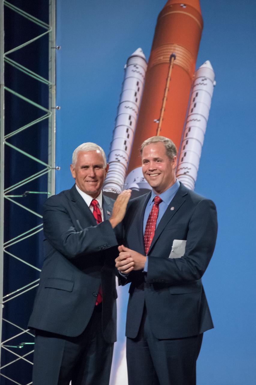 jsc2018e076186 (Aug. 23, 2018) --- Vice President Mike Pence (right) visited NASA’s Johnson Space Center in Houston with NASA Administrator Jim Bridenstine (left) on Aug. 23, 2018, to discuss the future of space exploration and other elements of human spaceflight. During his trip to the Johnson Space Center, the Vice President also toured the laboratory housing the moon rocks retrieved during the Apollo program’s lunar missions and extraterrestrial samples from other uncrewed sample return missions, as well as the Sonny Carter Training Facility (Neutral Buoyancy Lab) where astronauts practice spacewalking techniques they will employ when they fly in space.