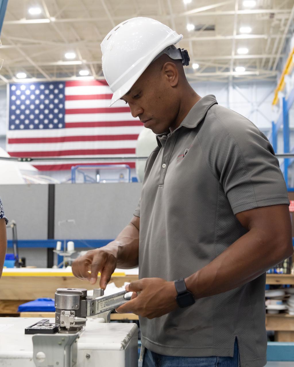 NASA commercial crew astronaut Victor Glover learns about the tools and hardware he will use in spacewalk training at NASA’s Space Vehicle Mockup Facility in Houston. Glover will fly to the International Space Station on the second flight of SpaceX’s Crew Dragon.