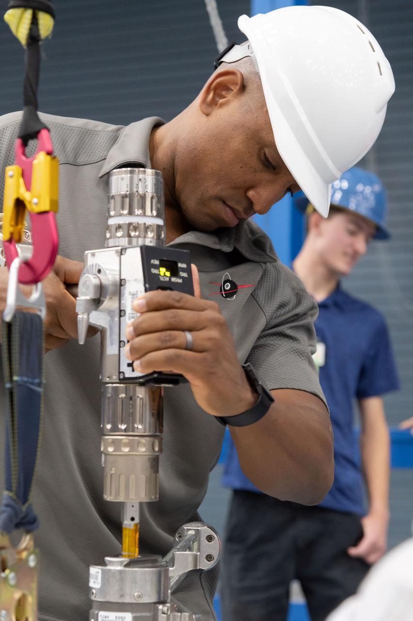 NASA commercial crew astronaut Victor Glover learns about the tools and hardware he will use in spacewalk training at NASA’s Space Vehicle Mockup Facility in Houston. Glover will fly to the International Space Station on the second flight of SpaceX’s Crew Dragon.