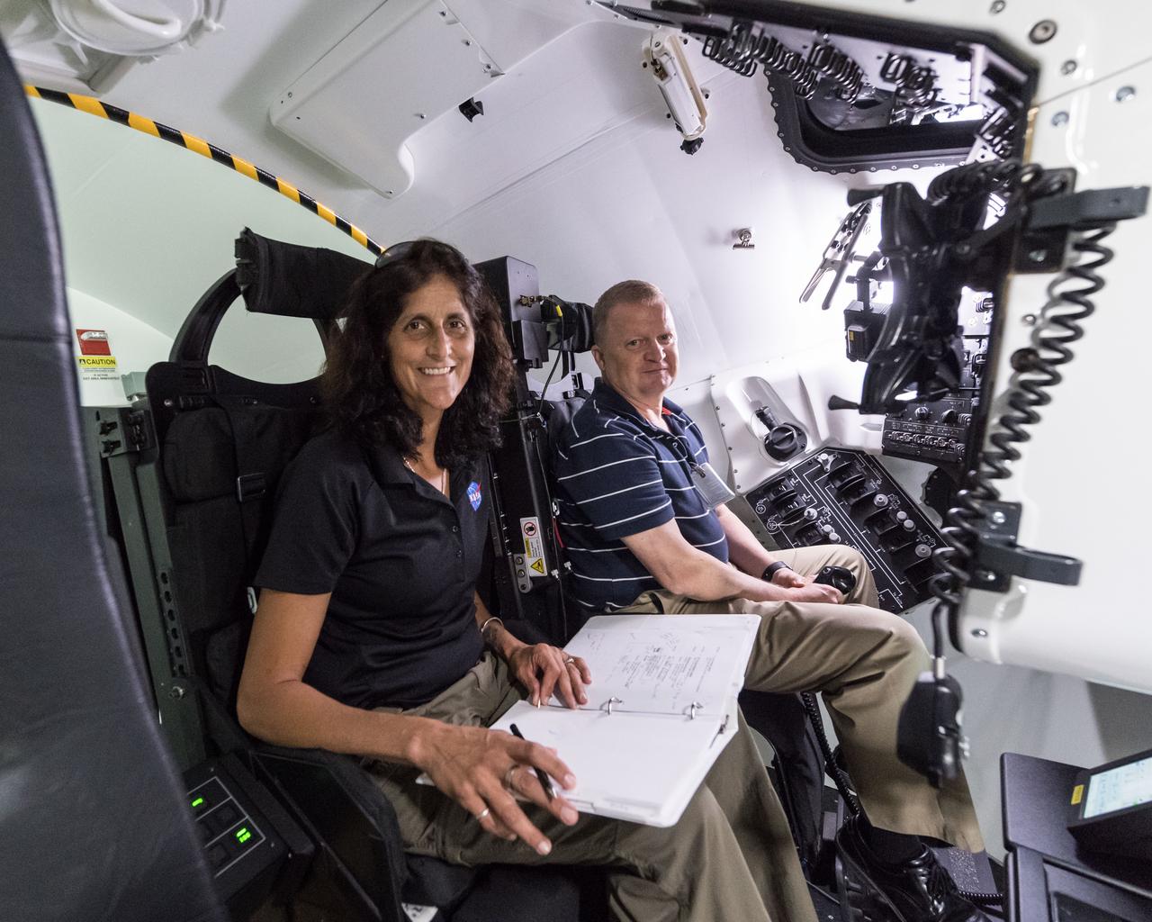 NASA commercial crew astronauts Eric Boe and Suni Williams train in a Boeing CST-100 Starliner mockup at the agency’s Johnson Space Center in Houston. Boe is assigned to launch to the International Space Station on the first crewed flight of Boeing’s CST-100 Starliner. Williams will fly to the space station on Starliner’s second crewed flight.
