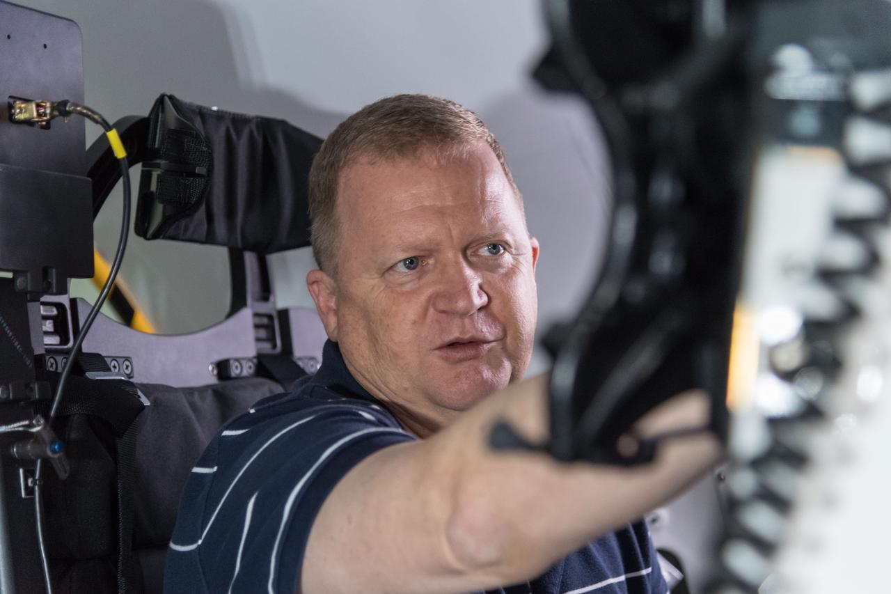 NASA commercial crew astronaut Eric Boe trains in a Boeing CST-100 Starliner mockup at the agency’s Johnson Space Center in Houston. Boe is assigned to launch to the International Space Station on the first crewed flight of Boeing’s CST-100 Starliner.
