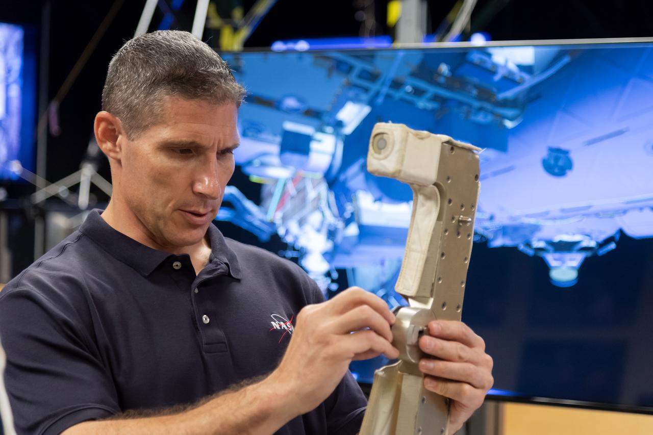 NASA commercial crew astronaut Mike Hopkins trains with Extravehicular Activity (EVA) tools and hardware in Johnson Space Center’s Space Vehicle Mockup Facility in Houston. Hopkins is assigned to the second crewed flight of SpaceX’s Crew Dragon.