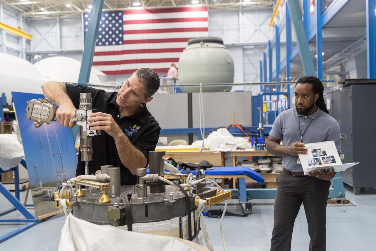 NASA commercial crew astronaut Mike Hopkins trains with Extravehicular Activity (EVA) tools and hardware in Johnson Space Center’s Space Vehicle Mockup Facility in Houston. Hopkins is assigned to the second crewed flight of SpaceX’s Crew Dragon.