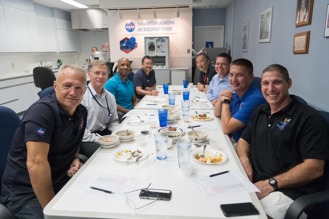 Commercial Crew Program astronauts try out some of the food they’ll enjoy onboard the International Space Station at the Space Food Systems Laboratory at Johnson Space Center in Houston. NASA astronauts Bob Behnken, Doug Hurley, Mike Hopkins and Victor Glover will fly on the SpaceX Crew Dragon. NASA astronaut Kjell Lindgren is assigned as a backup for the Crew Dragon’s first and second crewed flights. Boeing astronaut Chris Ferguson will fly on Boeing’s CST-100 Starliner. Also joining them for the taste tests are Japan Aerospace Exploration Agency astronauts Shoichi Noguchi and Akihiko Hoshide. Noguchi is scheduled to be part of the Expedition 62-63 crew, and Hoshide is training for Expedition 64-65.