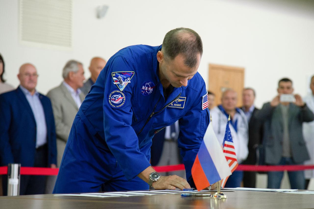 jsc2018e081042 (Sept. 12, 2018) --- At the Gagarin Cosmonaut Training Center in Star City, Russia, Expedition 57 crewmember Nick Hague of NASA signs in Sept. 13 for the first day of Soyuz qualification exams. Hague and Alexey Ovchinin of Roscosmos are scheduled to launch Oct. 11 from the Baikonur Cosmodrome in Kazakhstan on the Soyuz MS-10 spacecraft for a six month mission on the International Space Station...NASA/Elizabeth Weissinger.