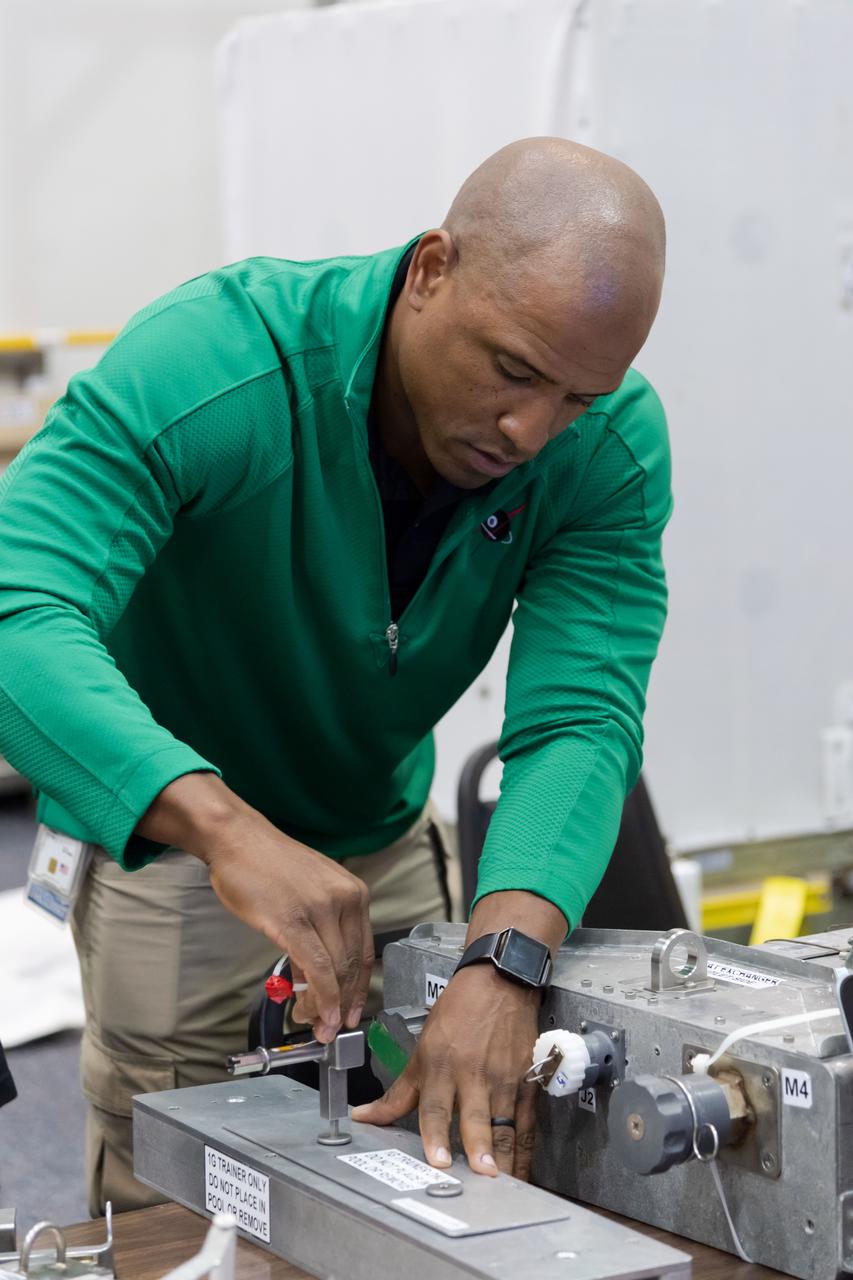 NASA commercial crew astronaut Victor Glover gets training on some of the tools he could use during spacewalks at the International Space Station. Glover is assigned to the SpaceX Crew Dragon’s second crewed flight.