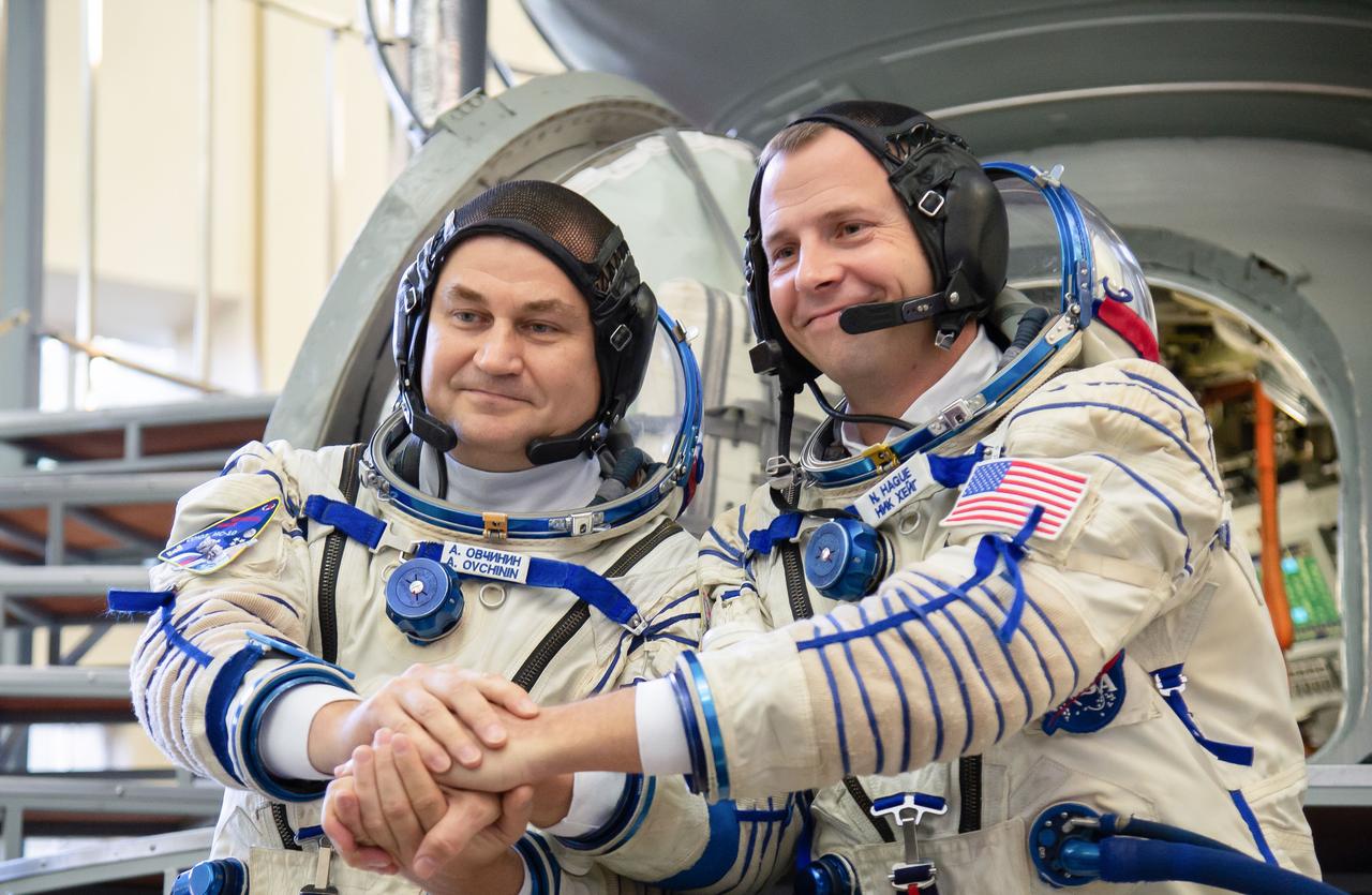 jsc2018e081177 (Sept. 14, 2018) --- At the Gagarin Cosmonaut Training Center in Star City, Russia, Expedition 57 crew members Alexey Ovchinin of Roscosmos (left) and Nick Hague of NASA (right) pose for pictures Sept. 14 during their Soyuz qualification exam activities. They will launch Oct. 11 on the Soyuz MS-10 spacecraft from the Baikonur Cosmodrome in Kazakhstan for a six-month mission on the International Space Station. Credit: NASA/Elizabeth Weissinger.