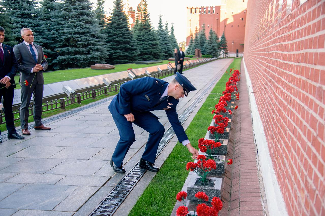 At Red Square in Moscow, Expedition 57 crewmember Nick Hague of NASA lays flowers at the Kremlin Wall where Russian space icons are interred as part of traditional ceremonies Sept. 17. Hague and Alexey Ovchinin of Roscosmos will launch Oct. 11 from the Baikonur Cosmodrome in Kazakhstan on the Soyuz MS-10 spacecraft for a six-month mission on the International Space Station...NASA/Elizabeth Weissinger.