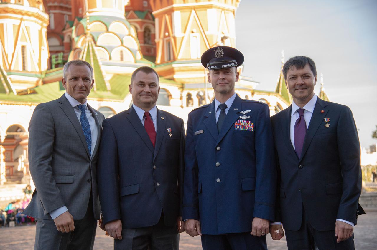 With St. Basil’s Cathedral in Red Square in Moscow serving as a backdrop, the Expedition 57 prime and backup crewmembers pose for pictures Sept. 17 as part of prelaunch activities. From left to right are backup crewmember David Saint-Jacques of the Canadian Space Agency, prime crewmembers Alexey Ovchinin of Roscosmos and Nick Hague of NASA and backup crewmember Oleg Kononenko of Roscosmos. Hague and Ovchinin will launch Oct. 11 from the Baikonur Cosmodrome in Kazakhstan on the Soyuz MS-10 spacecraft for a six-month mission on the International Space Station...NASA/Elizabeth Weissinger.