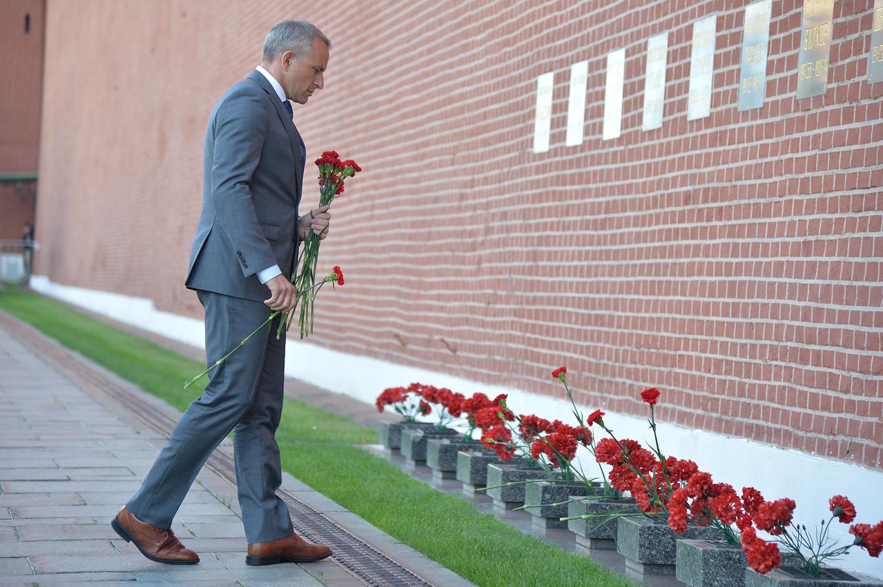 At Red Square in Moscow, Expedition 57 backup crewmember David Saint-Jacques of the Canadian Space Agency lays flowers at the Kremlin Wall where Russian space icons are interred as part of traditional ceremonies Sept. 17. Saint-Jacques is a backup to the prime crew, Nick Hague of NASA and Alexey Ovchinin of Roscosmos, who will launch Oct. 11 from the Baikonur Cosmodrome in Kazakhstan on the Soyuz MS-10 spacecraft for a six-month mission on the International Space Station...NASA/Sarah Volkman.