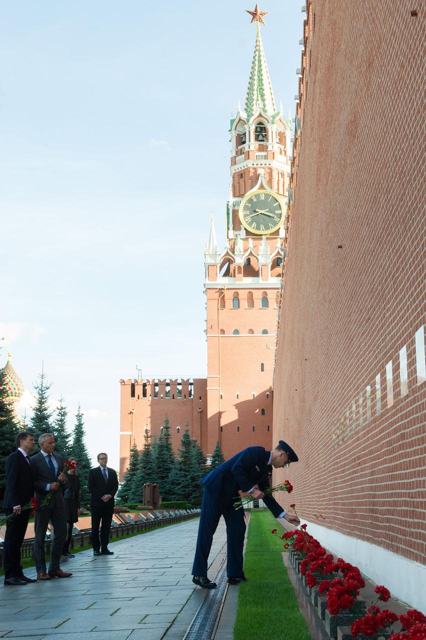At Red Square in Moscow, Expedition 57 crewmember Nick Hague of NASA lays flowers at the Kremlin Wall where Russian space icons are interred as part of traditional ceremonies Sept. 17. Hague and Alexey Ovchinin of Roscosmos will launch Oct. 11 from the Baikonur Cosmodrome in Kazakhstan on the Soyuz MS-10 spacecraft for a six-month mission on the International Space Station...Andrey Shelepin and Irina Spektor/Gagarin Cosmonaut Training Center.