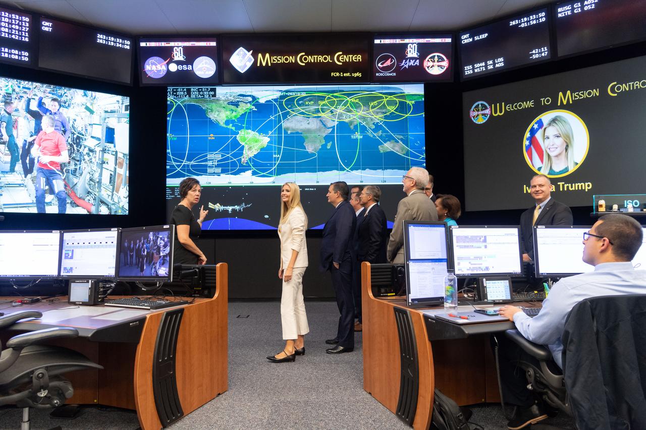 jsc2018e083375 – (Sept. 20, 2018) – NASA Chief Flight Director Holly Ridings shows Advisor to the President Ivanka Trump around the International Space Station Flight Control Room in the Mission Control Center during a visit to NASA’s Johnson Space Center. She was joined by U.S. Senator Ted Cruz, U.S. Representative Brian Babin, NASA Administrator Jim Bridenstine, and Johnson Center Director Mark Geyer.