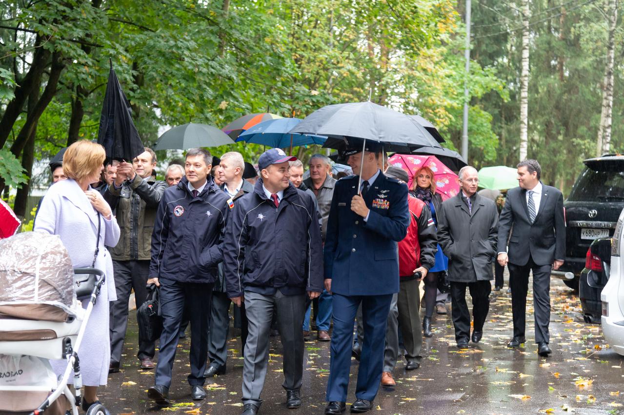 At the Gagarin Cosmonaut Training Center in Star City, Russia, Expedition 57 crewmember Nick Hague of NASA (foreground, right) chats with crewmate Alexey Ovchinin of Roscosmos Sept. 25 as they walk to a bus that will take them to a nearby airfield for a flight to their launch site in Baikonur, Kazakhstan for final pre-launch training. Hague and Ovchinin will launch Oct. 11 from the Baikonur Cosmodrome in Kazakhstan on the Soyuz MS-10 spacecraft for a six-month mission on the International Space Station...NASA/Elizabeth Weissinger.