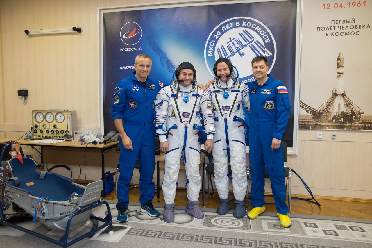 jsc2018e084491 - At the Baikonur Cosmodrome in Kazakhstan, the Expedition 57 prime and backup crewmembers pose for pictures Sept. 26 during pre-launch training activities. From left to right are backup crewmember David Saint-Jacques of the Canadian Space Agency, prime crewmembers Alexey Ovchinin of Roscosmos and Nick Hague of NASA and backup crewmember Oleg Kononenko of Roscosmos. Ovchinin and Hague will launch Oct. 11 in the Soyuz MS-10 spacecraft from the Baikonur Cosmodrome for a six-month mission on the International Space Station...NASA/Victor Zelentsov.