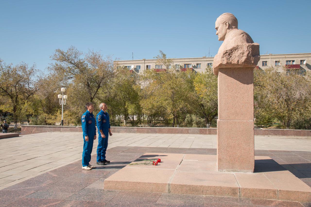 jsc2018e084640 - During a tour of the city of Baikonur, Kazakhstan, Expedition 57 crewmembers Oleg Kononenko of Roscosmos and David Saint-Jacques of the Canadian Space Agency paid tribute to Sergei Korolev, the Russian space designer icon Sept. 27 at his statue in traditional pre-launch ceremonies. They are the backups to the prime crew, Alexey Ovchinin of Roscosmos and Nick Hague of NASA, who will launch Oct. 11 on the Soyuz MS-10 spacecraft from the Baikonur Cosmodrome in Kazakhstan for a six-month mission on the International Space Station...NASA/Victor Zelentsov.