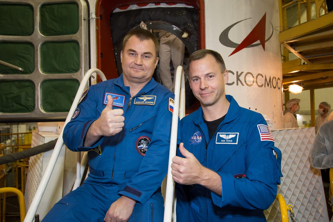 At the Baikonur Cosmodrome in Kazakhstan, Expedition 57 crewmembers Alexey Ovchinin of Roscosmos (left) and Nick Hague of NASA (right) pose for pictures Oct. 6 in front of the Soyuz MS-10 spacecraft. They will launch Oct. 11 from the Baikonur Cosmodrome on the Soyuz MS-10 spacecraft for a six-month mission on the International Space Station...NASA/Victor Zelentsov.