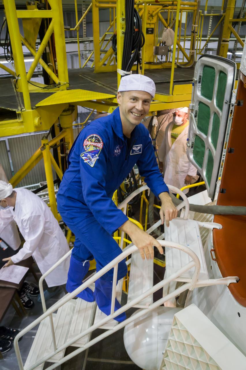 At the Baikonur Cosmodrome in Kazakhstan, Expedition 57 crewmember Nick Hague of NASA flashes a smile Oct. 6 as he boards the Soyuz MS-10 spacecraft for a final fit check. Hague and Alexey Ovchinin of Roscosmos will launch Oct. 11 from the Baikonur Cosmodrome on the Soyuz MS-10 spacecraft for a six-month mission on the International Space Station...NASA/Victor Zelentsov.