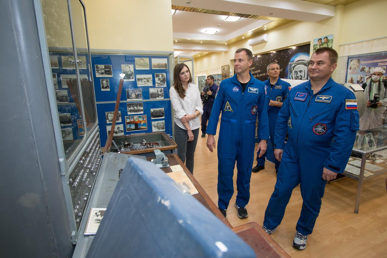 At the Baikonur Cosmodrome Museum in Kazakhstan, Expedition 57 crewmembers Nick Hague of NASA (left) and Alexey Ovchinin of Roscosmos view space artifacts Oct. 6 as part of a traditional pre-launch tour. Behind them is backup crewmember David Saint-Jacques of the Canadian Space Agency. Hague and Ovchinin will launch Oct. 11 from the Baikonur Cosmodrome on the Soyuz MS-10 spacecraft for a six-month mission on the International Space Station...NASA/Victor Zelentsov.