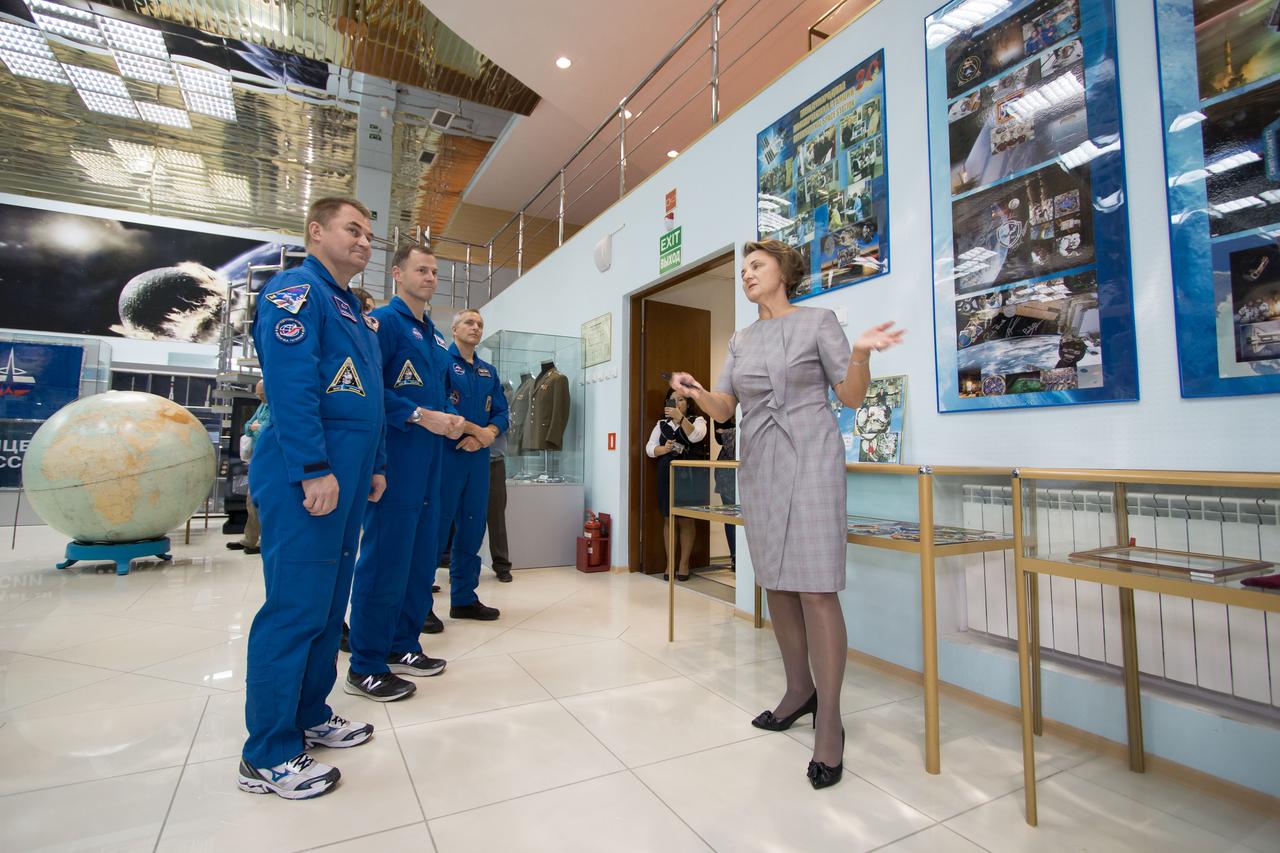 At the Baikonur Cosmodrome Museum in Kazakhstan, Expedition 57 prime crewmembers Alexey Ovchinin of Roscosmos (left) and Nick Hague of NASA (center) and backup crewmember David Saint-Jacques of the Canadian Space Agency (right) receive a briefing Oct. 6 on some of the artifacts housed in the facility during traditional pre-launch activities. Hague and Ovchinin will launch Oct. 11 from the Baikonur Cosmodrome on the Soyuz MS-10 spacecraft for a six-month mission on the International Space Station...NASA/Victor Zelentsov.