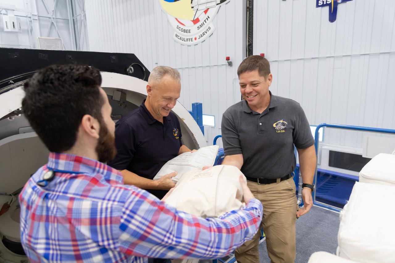 NASA commercial crew astronauts Doug Hurley and Bob Behnken attend a training class for International Space Station ingress and egress procedures in the Space Vehicle Mock-Up Facility at Johnson Space Center in Houston. Hurley and Behnken are both assigned to the SpaceX Crew Dragon’s first crewed flight.