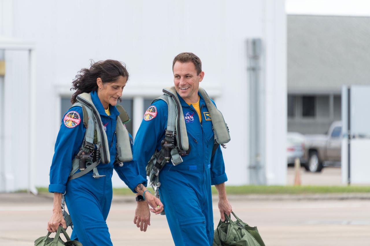 NASA commercial crew astronauts Josh Cassada and Suni Williams prepare for T-38 training flights at Ellington Field Joint Reserve Base in Houston. Cassada and Williams are assigned to the Boeing Starliner’s second crewed flight.