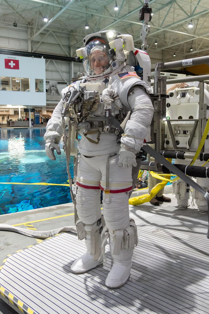 jsc2018e094733 (November 05, 2018) --- 2017 NASA astronaut candidate Loral O’Hara wears a spacesuit prior to underwater spacewalk training at NASA Johnson Space Center’s Neutral Buoyancy Laboratory in Houston. Photo Credit: (NASA/Josh Valcarcel)