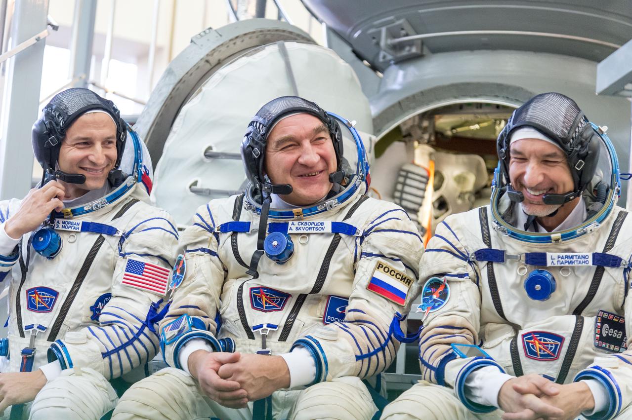 jsc2018e094959 - At the Gagarin Cosmonaut Training Center in Star City, Russia, Expedition 58 backup crewmembers Drew Morgan of NASA (left), Alexander Skvortsov of Roscosmos (center) and Luca Parmitano of the European Space Agency (right) meet with reporters Nov. 13 during qualification exam training. They are the backups to the prime crew, Oleg Kononenko of Roscosmos, Anne McClain of NASA and David Saint-Jacques of the Canadian Space Agency, who will launch Dec. 3 on the Soyuz MS-11 spacecraft from the Baikonur Cosmodrome in Kazakhstan for a six-and-a-half month mission on the International Space Station...NASA/Sarah Volkman.