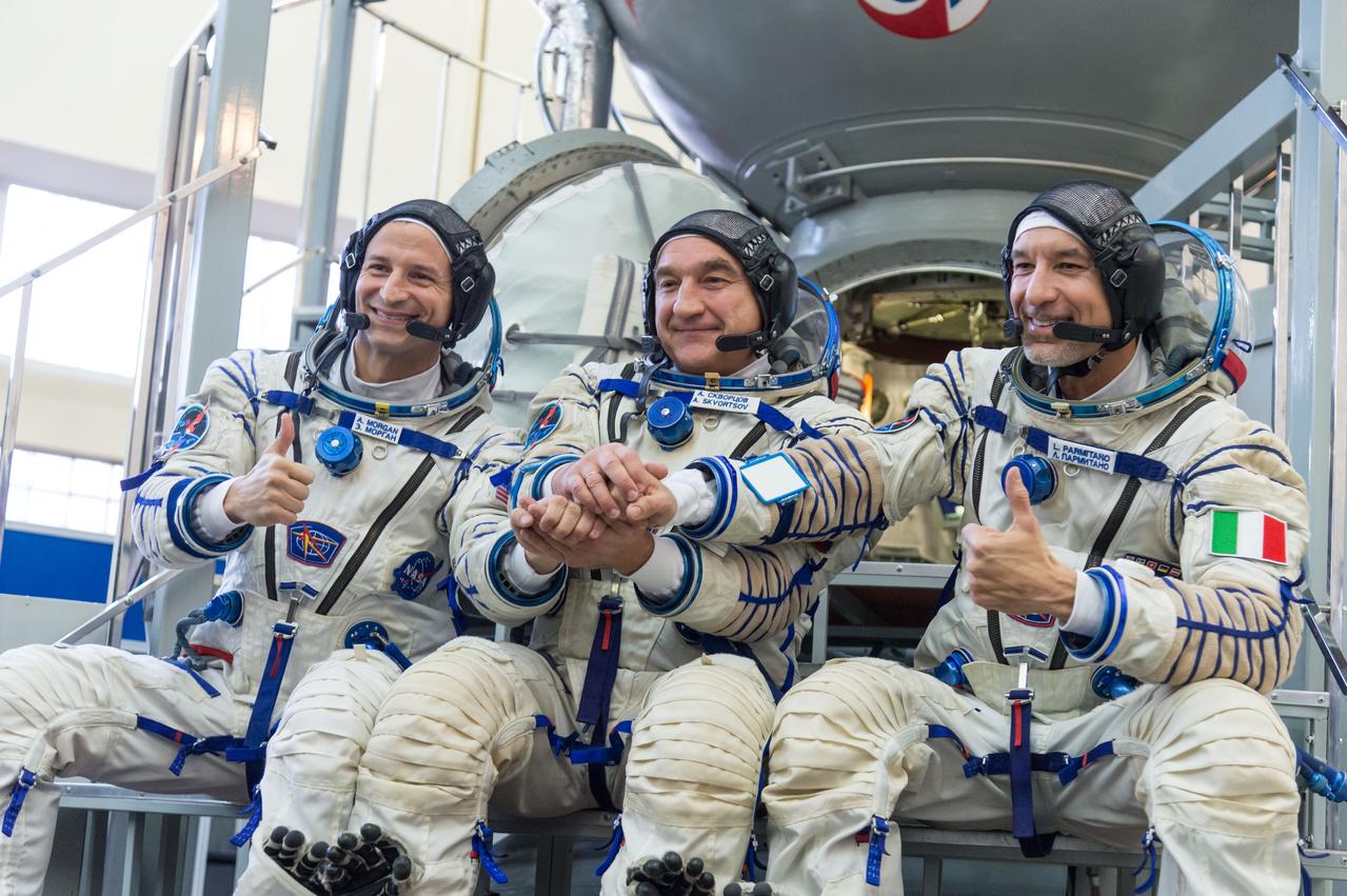jsc2018e094960 - At the Gagarin Cosmonaut Training Center in Star City, Russia, Expedition 58 backup crewmembers Drew Morgan of NASA (left), Alexander Skvortsov of Roscosmos (center) and Luca Parmitano of the European Space Agency (right) pose for pictures Nov. 13 during qualification exam training. They are the backups to the prime crew, Oleg Kononenko of Roscosmos, Anne McClain of NASA and David Saint-Jacques of the Canadian Space Agency, who will launch Dec. 3 on the Soyuz MS-11 spacecraft from the Baikonur Cosmodrome in Kazakhstan for a six-and-a-half month mission on the International Space Station...NASA/Sarah Volkman.