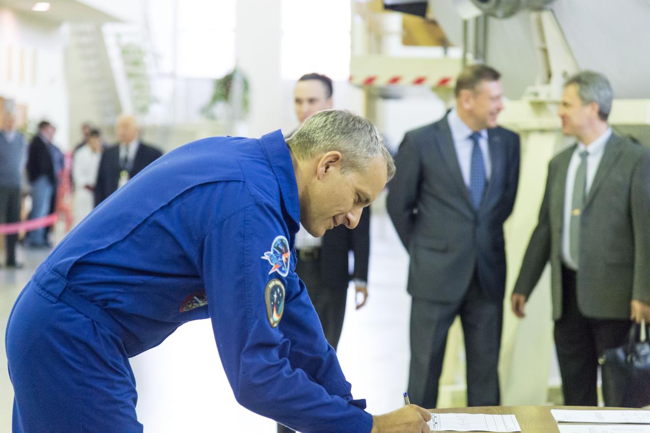 jsc2018e094963 - At the Gagarin Cosmonaut Training Center in Star City, Russia, Expedition 58 crewmember David Saint-Jacques of the Canadian Space Agency signs in for his qualification exams Nov. 13. Saint-Jacques, Anne McClain of NASA and Oleg Kononenko of Roscosmos will launch Dec. 3 on the Soyuz MS-11 spacecraft from the Baikonur Cosmodrome in Kazakhstan for a six-and-a-half month mission on the International Space Station...NASA/Sarah Volkman.